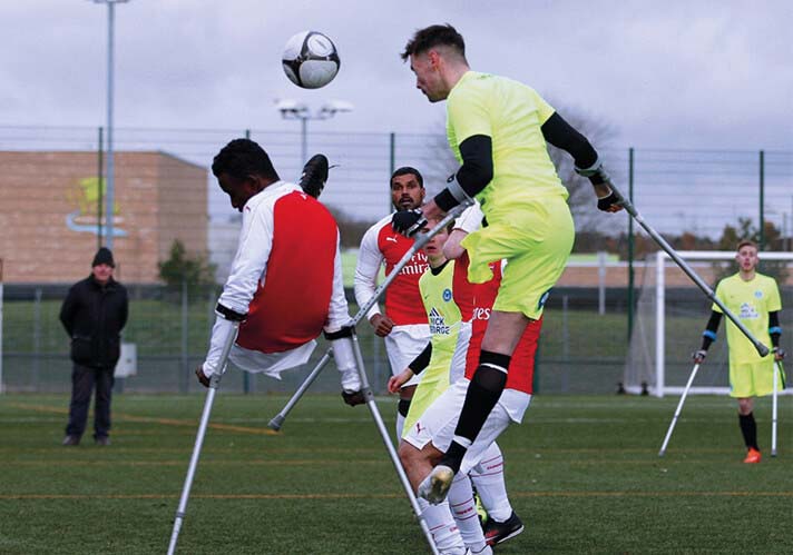 amputee footballers contesting the ball